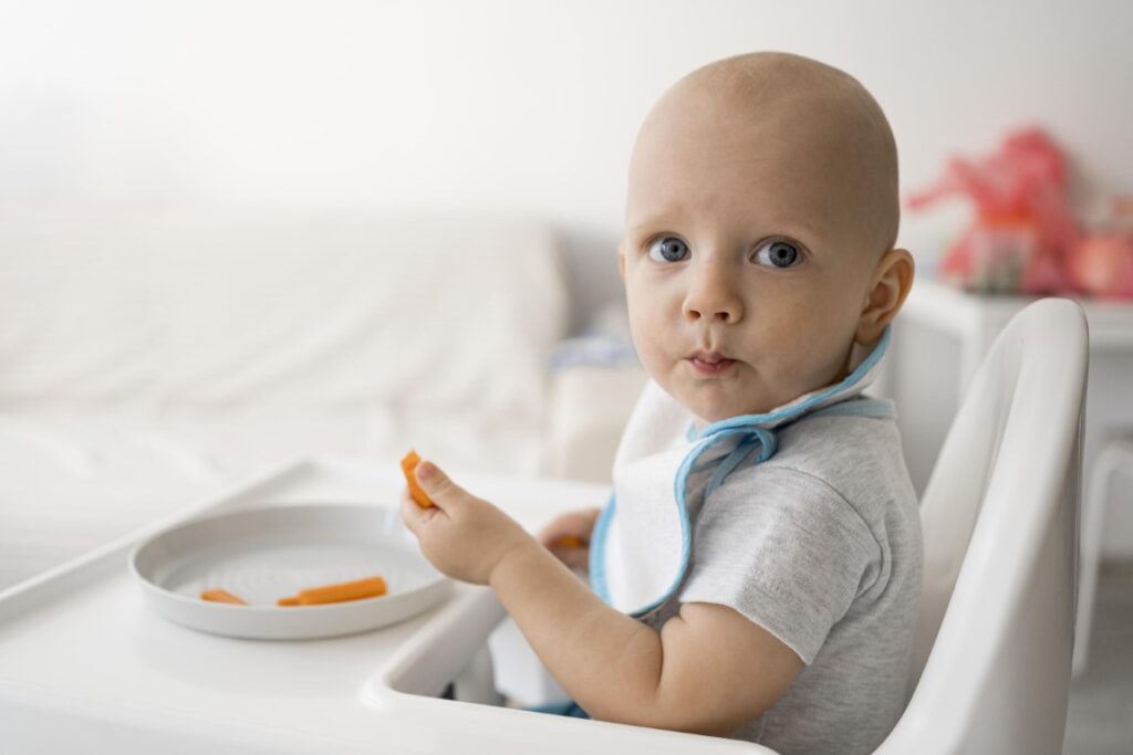 adorable-baby-playing-with-food