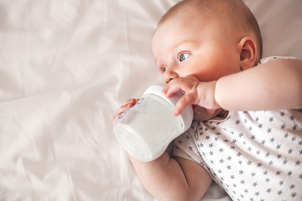 little-cute-baby-eating-formula-infant-feedeng