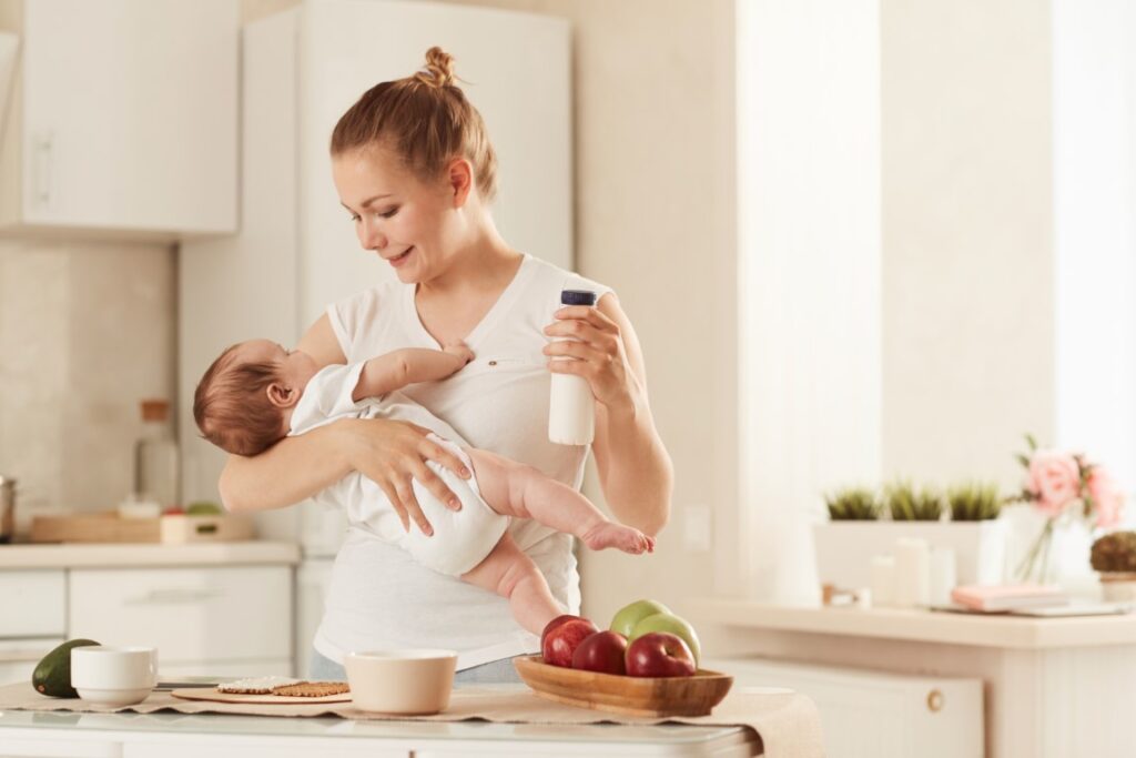 young-mother-feeding-baby